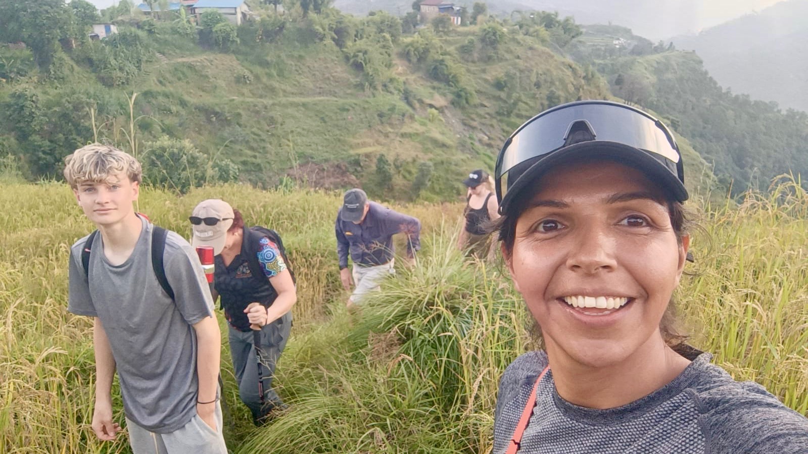 Sital leading a small group through the hills near Pokhara